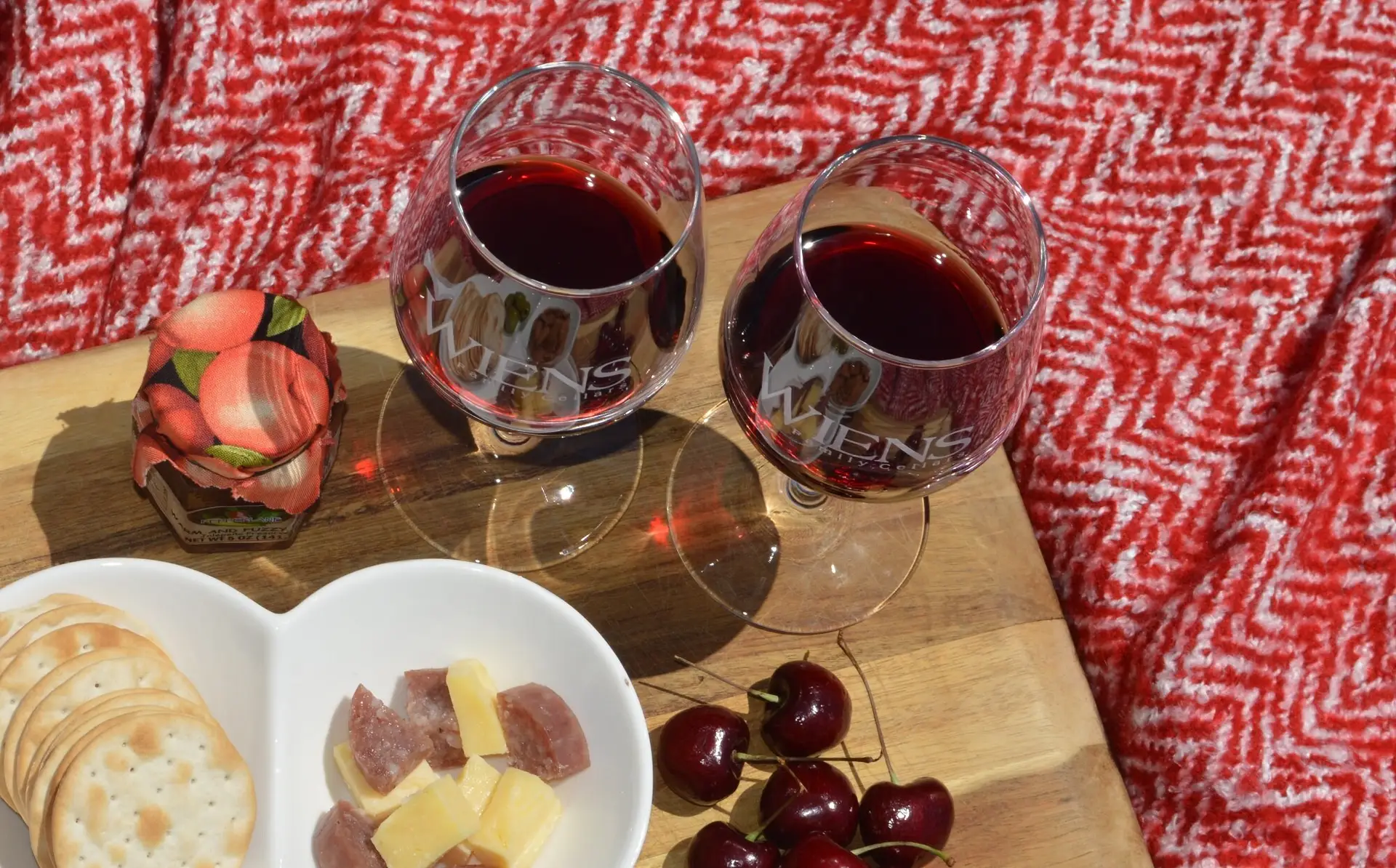 red wine and charcuterie at a picnic